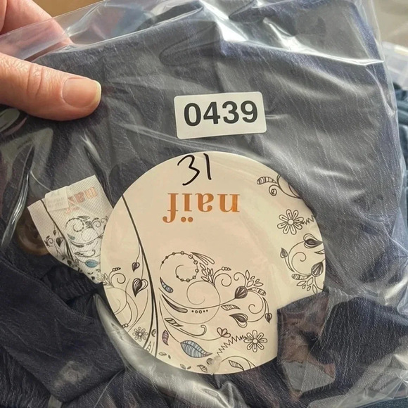 WOMAN’S wide leg jumpsuit by Naïf. - Picture 12 of 12